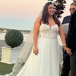 Ivory Lace Appliqué Wedding Gown with Sheer Bodice